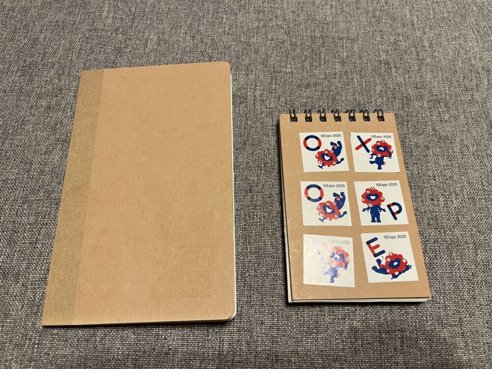 大阪万博で持って行ったスタンプ帳がわりの無印良品のノート写真